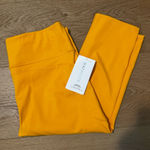 Athleta New Ultimate Stash II Capri Leggings Gold Yellow Size XL Photo 0