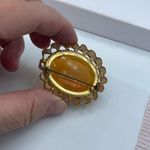 Vintage huge W.Germany facetted amber colored glass brooch. Gold Photo 4