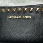 Michael Kors  Womens Saffiano Leather Stud Long Zip Clutch with gold tone studs. Photo 4