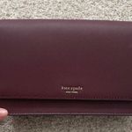 Kate Spade Maroon Crossbody Bag with Gold Chain Strap Photo 1