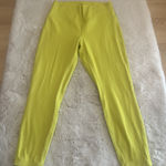 Lululemon women's high-rise leggings in neon yellow. Stretchy, Size 12 Photo 0