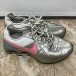 Nike Shox Deliver Women’s Athletic Sneaker metallic silver and pink Photo 0