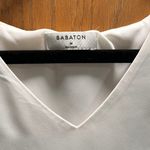 Babaton Aritzia  Cropped White Sleeveless Blouse Photo 1