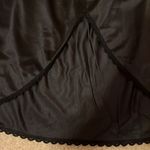 Vintage Warners black half slip size small Photo 1