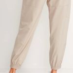 Athleta Go Far Travel Venture Pant Womens 2 XS Tapered Jogger Beige Athleisure Photo 3