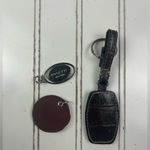 Rosetti Keychain Lot ā Logo Leather & Metal Tag Charms (Set of 3) Photo 4