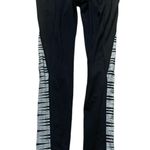 Athleta Black Leggings with Black and White Stripes Photo 0