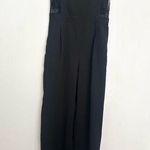 Romeo + Juliet Couture Sheer Lace Panel Cut Out Short Sleeve Jumpsuit. Photo 0