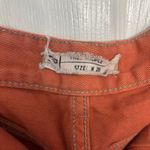 Free People Women's Shorts Washed Denim Raw Hem Pockets Burnt Orange Size 28 Photo 2