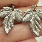 Silver tone maple leaf earrings Photo 0