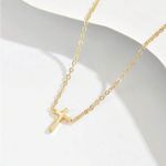 Dainty Gold Cross Pendant Necklace Photo 0