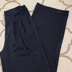 Nike Bliss Dri-FIT Trousers pleated side pockets wide leg black pant,size small Photo 0