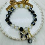 Gradient Black Beaded w/ Sparkly Bow Charm Bracelet Photo 1