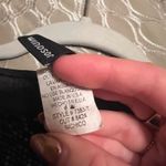 Windsor Stunning black sequin set featuring a long sleeve crop top and matching skirt. Perfect for a night out. Photo 2