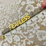 BCBGeneration Gray Leather with Gold "Fearless" Text on snap Bracelet Photo 1