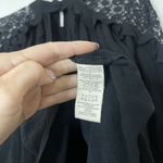 Free People  long sleeve black embroidered ruffle hem blouse top small Photo 3