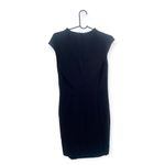 Trina Turk black dress with belt buckle detail Photo 1