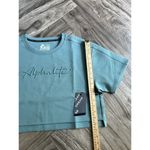 Alphalete NEW  Woman’s  ELMTS Short SLEEVE Crop - Teal , Size Medium Photo 4