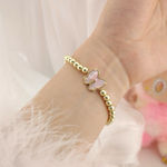 Kendra Scott  Haley Bow Gold Stretch Bracelet Photo 0