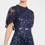 Mac Duggal  9192 Woman’s Blue Sequined High Neck Flutter Sleeve A Line Gown Photo 2