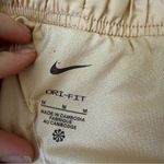 Nike  dri fit orange running shorts size women’s medium Photo 2