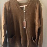 OVI XCVI V-Neck women’s oversized Sweater in Rich Brown small Photo 0