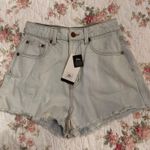 Rip Curl NWT denim shorts distressed   Photo 0