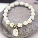 White‎ Stylish Elastic Beaded Cross Charm Bracelet Enamel Oval Cross Bead Accent White Photo 0