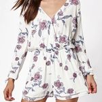 Kendall + Kylie White and purple floral long sleeve romper  Photo 0