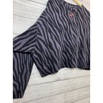 Nike Women's Sports Icon Clash Animal Print Crewneck Sweatshirt LARGE PURPLE-BLK Photo 6