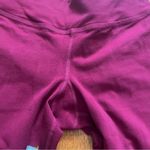 Beyond Yoga  pomegranate low rise flare leggings size small Photo 4