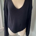 Free People  When It Rains V-Neck Knit Sweater in Black Photo 1