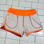 Nike Dri Fit Women's Athletic Running Shorts with pockets- Purple and Orange 292 Photo 5