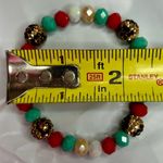 Red Green Cream Gold and Leopard beaded Necklace and Bracelet Set Photo 3