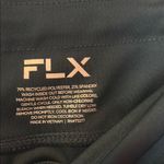 Black Track Pants with High Waist and Stretchy Fabric Photo 1