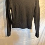 Q&A  Black Long Sleeve Top Photo 1