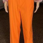 SheIn orange pants with hip cut out Photo 4