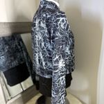 Spyder Black and White Running Jacket with layered Athletic Silhouette Photo 6