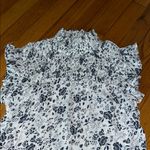 Adiva Black and White Ruffled Sleeveless Blouse Photo 1