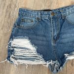 Pretty Little Thing ripped denim shorts size S. Photo 2