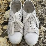 White airy sneakers with flower cutouts Size 8 Photo 1