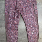 Athleta Printed Capri Leggings Side Zip Pockets Purple Pink Size L Photo 0