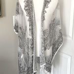 Stunning David and White Pattern Fringe Wrap Kimono Photo 0