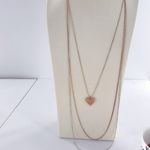 Boutique Long three strand necklace with pearl covered heart pendant. Photo 1