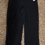 Athleta  Headland Hybrid Pant Size 0 Solid Black Zipper Pockets Nylon Blend NWT Photo 0