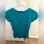 BCX  women’s top. Teal size medium cross front style. Short sleeves Photo 2
