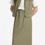 Goella Zippered Lapel Vest And Slit Half Skirt Two Photo 0