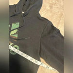 Adidas  Hoodie Women’s Size Medium Black Camo Logo Kangaroo Pocket Photo 4