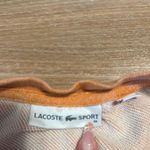 Lacoste sport women’s peach crewneck hoodie size 44 Has some ink stains and st Photo 1
