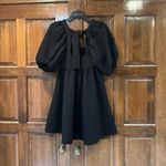 Free People  Violet Mini Dress In Black Size XS Puff Sleeve Tie Back Photo 1